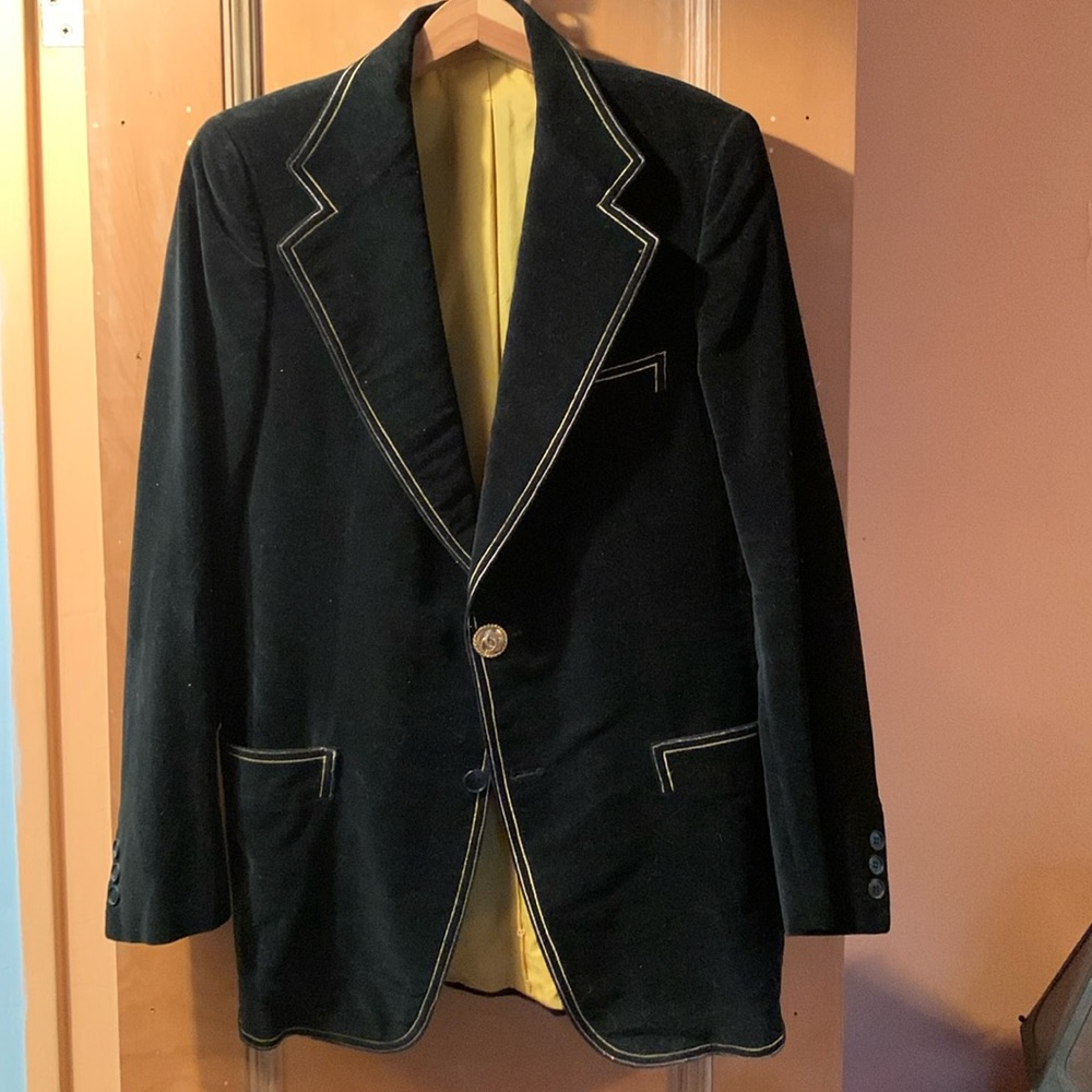 Vintage custom made black velvet men’s jacket with yellow silk lining.